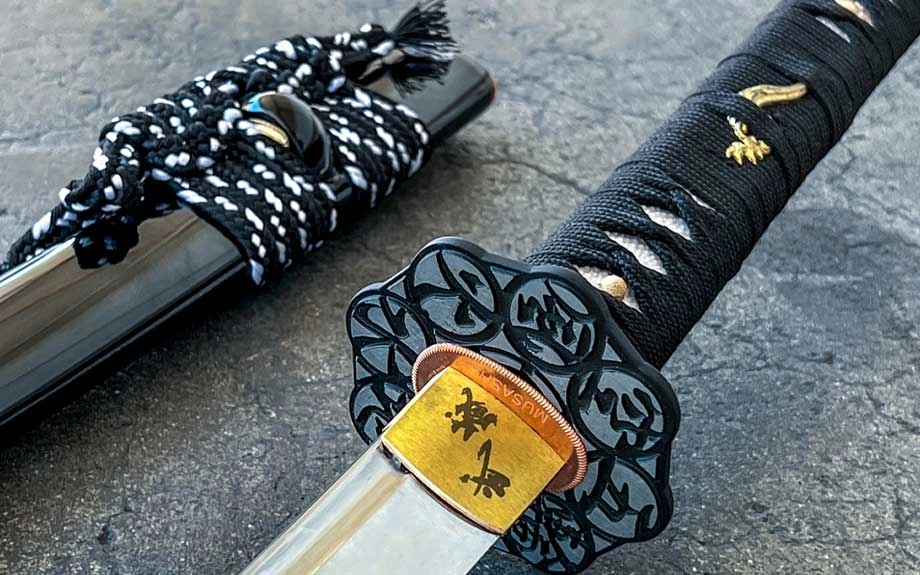 Close-up of a deluxe katana guard and wrapped handle